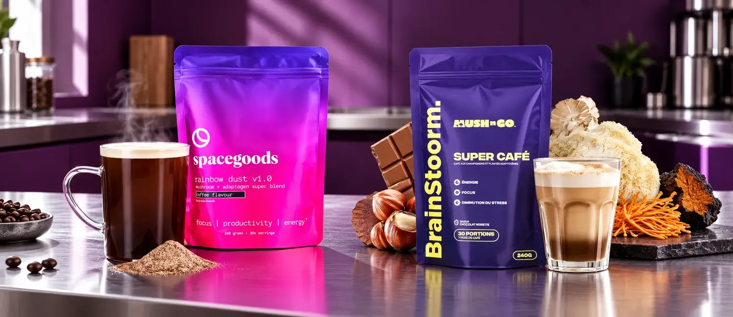 Spacegoods Rainbow Dust and Brainstoorm pouches side by side with a mug of black coffee, a latte, chocolate, hazelnuts and mushrooms on a purple kitchen worktop
