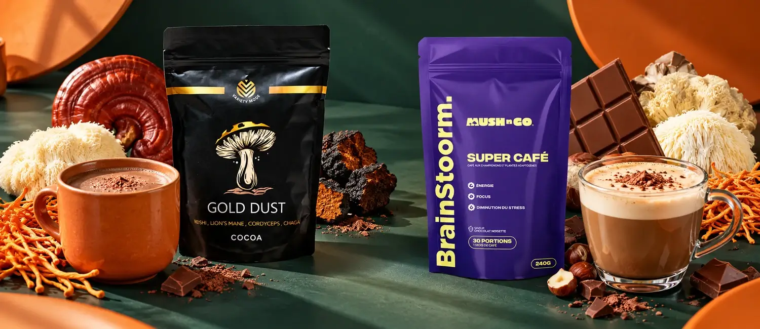 Variety Mode Gold Dust Cocoa and Brainstoorm pouches side by side with a mug of hot cocoa, a latte, mushrooms, chocolate and hazelnuts on a dark green background